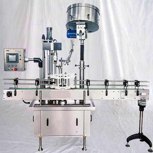 Fully automatic plastic bottles capping machine with robot caps dispens