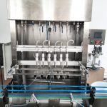 Автоматска опрема за полнење тегли со линеарни стаклени шишиња со пенаста со течноста за пенење