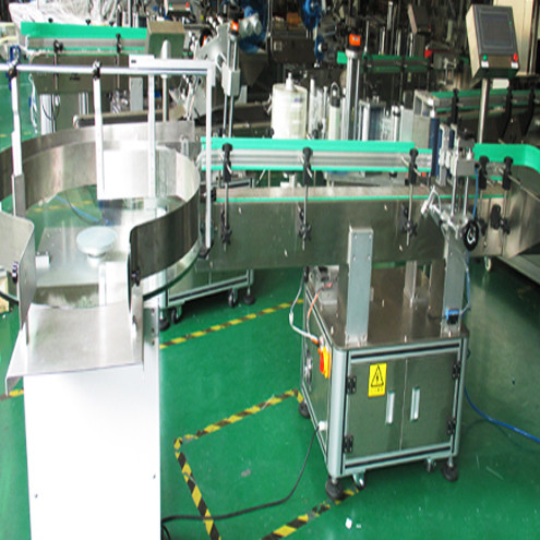 ラウンドターンテーブルボトル自動供給システムと透明なラベルラベラー機械自動で垂直赤ワインラベリングマシン