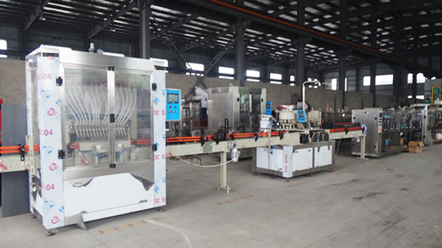 machine filling capping gravity filler.jpg