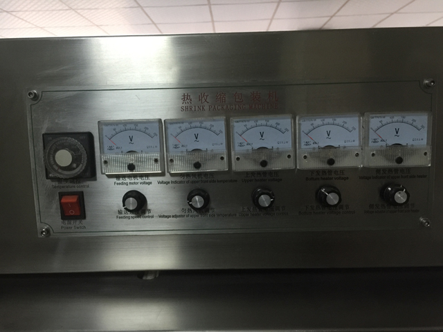 caps seal shrinking tunnel.jpg