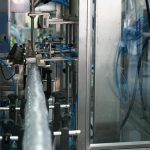 Automatic Bottle Filling Capping Labeling Cartoning Overwrapping Machine