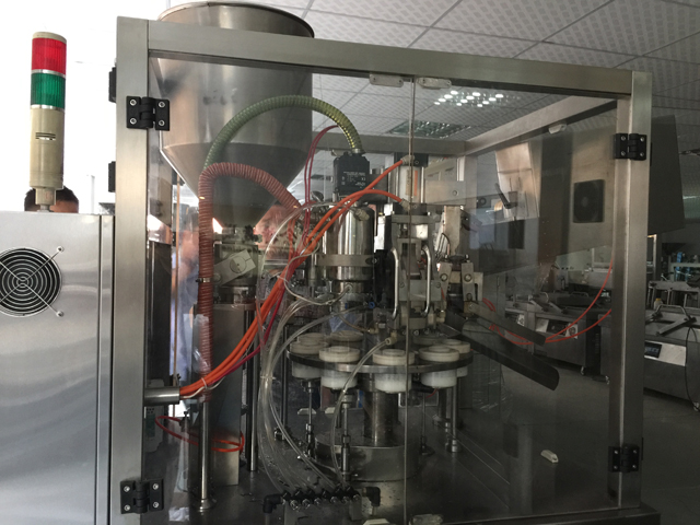 close pictures of tubes filling sealing machines working principle of tubes filling sealing machines.jpg