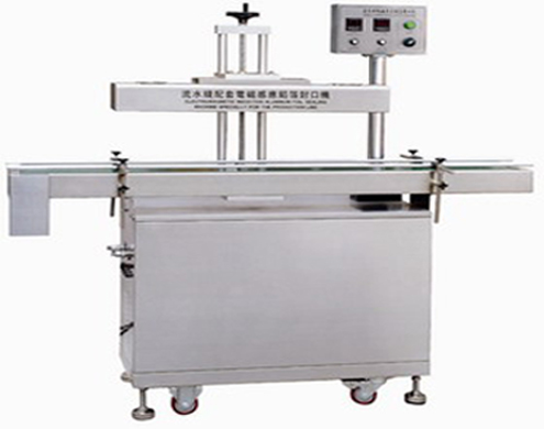 automatic aluminum foil sealing machine induction foil sealing machine.JPG
