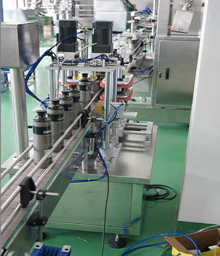 automatic capping machine with manual caps feeder system automatic capper with manual caps feeding.jpg