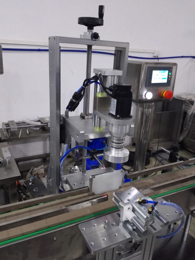 single head capping machine jars.jpg