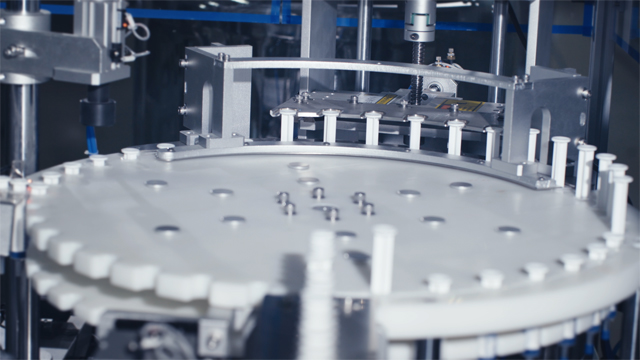 syringe filling capper.jpg