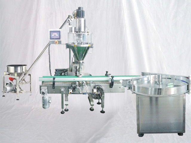 auger filling machine with bottles turntable.jpg