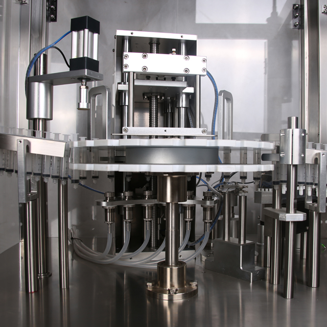 syringe filling capper.jpg