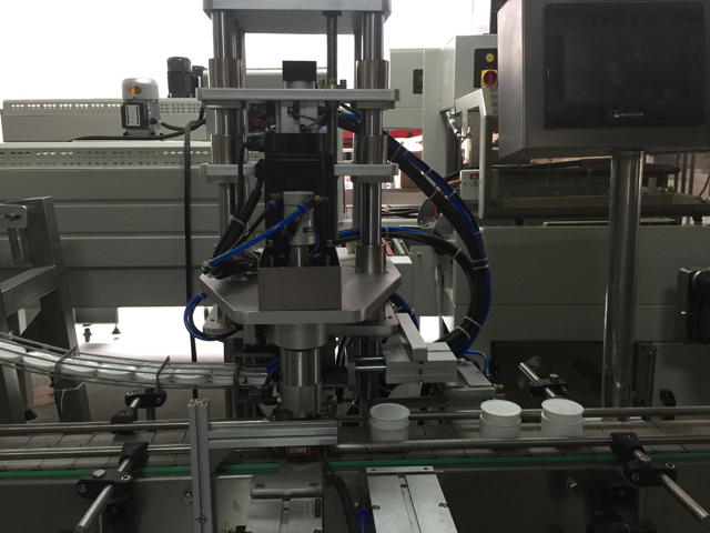 jars sealing machine.jpg