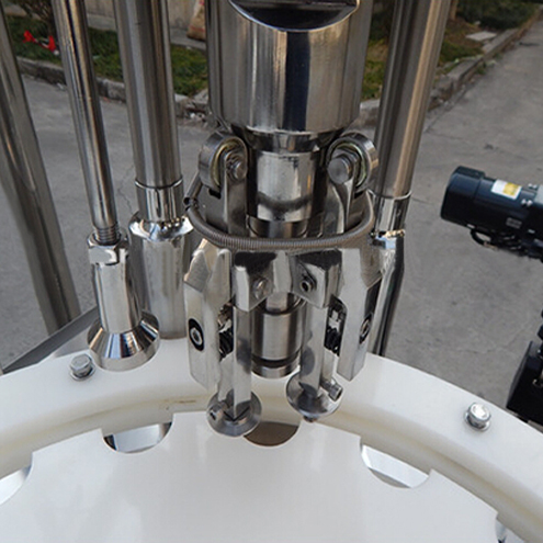 ropp capping heads for vial capper bottles ROPP capping equipment.jpg