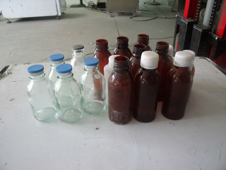 bottles for filling capping machine.jpg