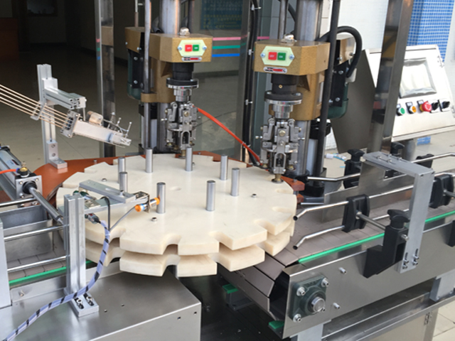 capping head double headed screw capper.jpg