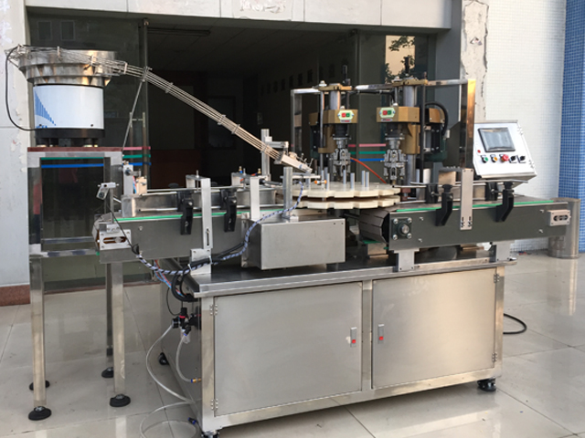 capping machine with 2 capping heads screw capper equipment semi automatic.jpg