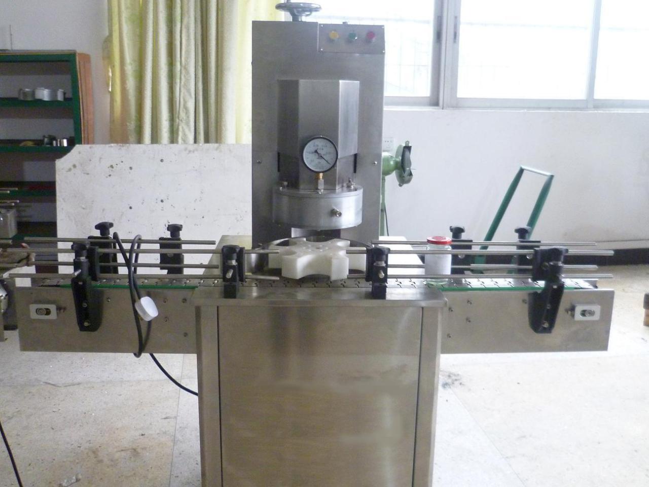rotary glass jar vacuum capping vacuum glass jar.jpg