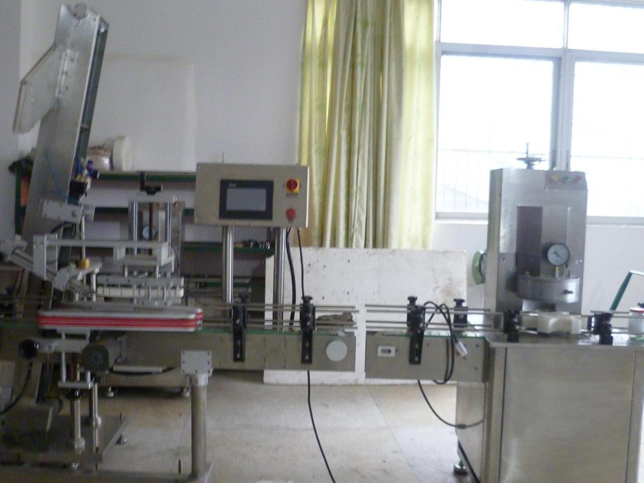 vacuum capping machine with cap placement vacuum capper for glass jar.JPG