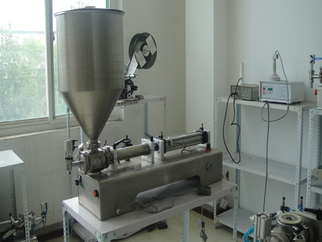  SINGLE HEAD WITH HOPPER FILLING MACHINE.jpg