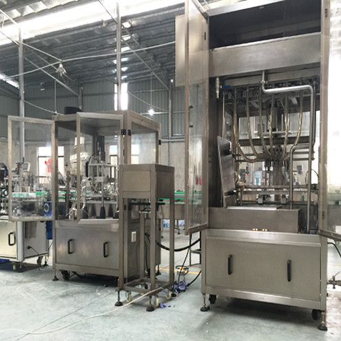 glass bottles vacuum air washing linear filling vacuum capping labeling9