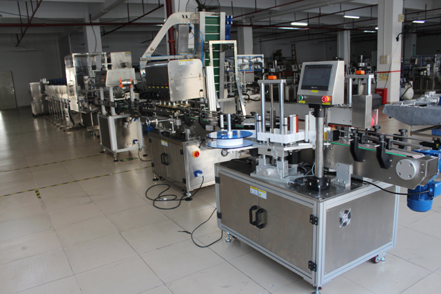 HIGH SPEED SCREW CAPPING MACHINE.jpg