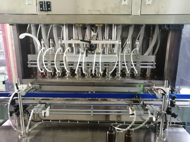 12 heads filling machine with mixing heater (4).jpg