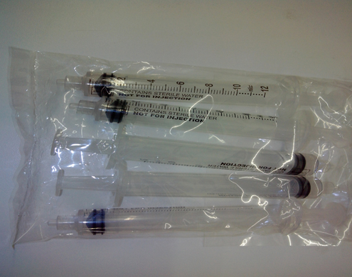 syringes syringe filling closer.jpg