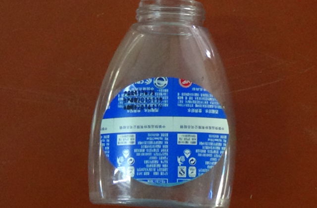 rolling labeling machine for flat bottles samples.jpg