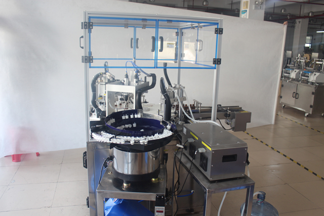 oil health care filling bottling machine.JPG