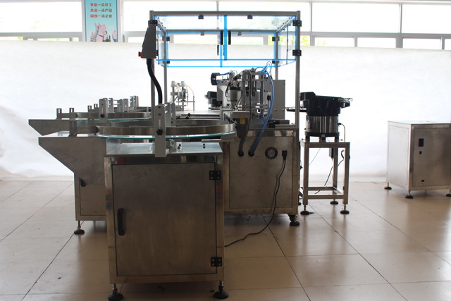 filling capping essential oil machine.jpg