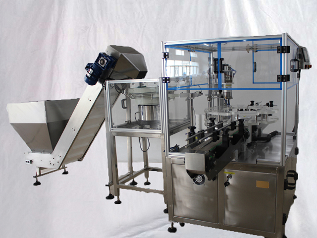 bottles capping machine with the caps loading system VKPAK