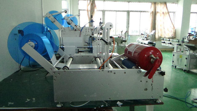 fire extinguisher labeller equipment semi automatic.jpg