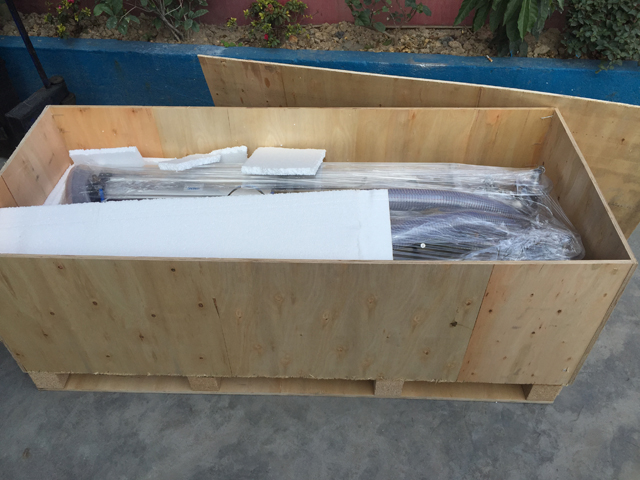 filling machines in wooden case.jpg