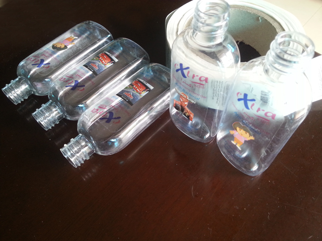 transparent labels labelled samples bottles plane surface Mrwan sample transparent labels and bottles (3).jpg