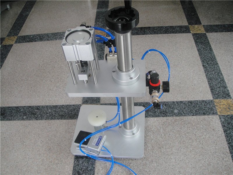 perfume bottle capping crimping machine.jpg