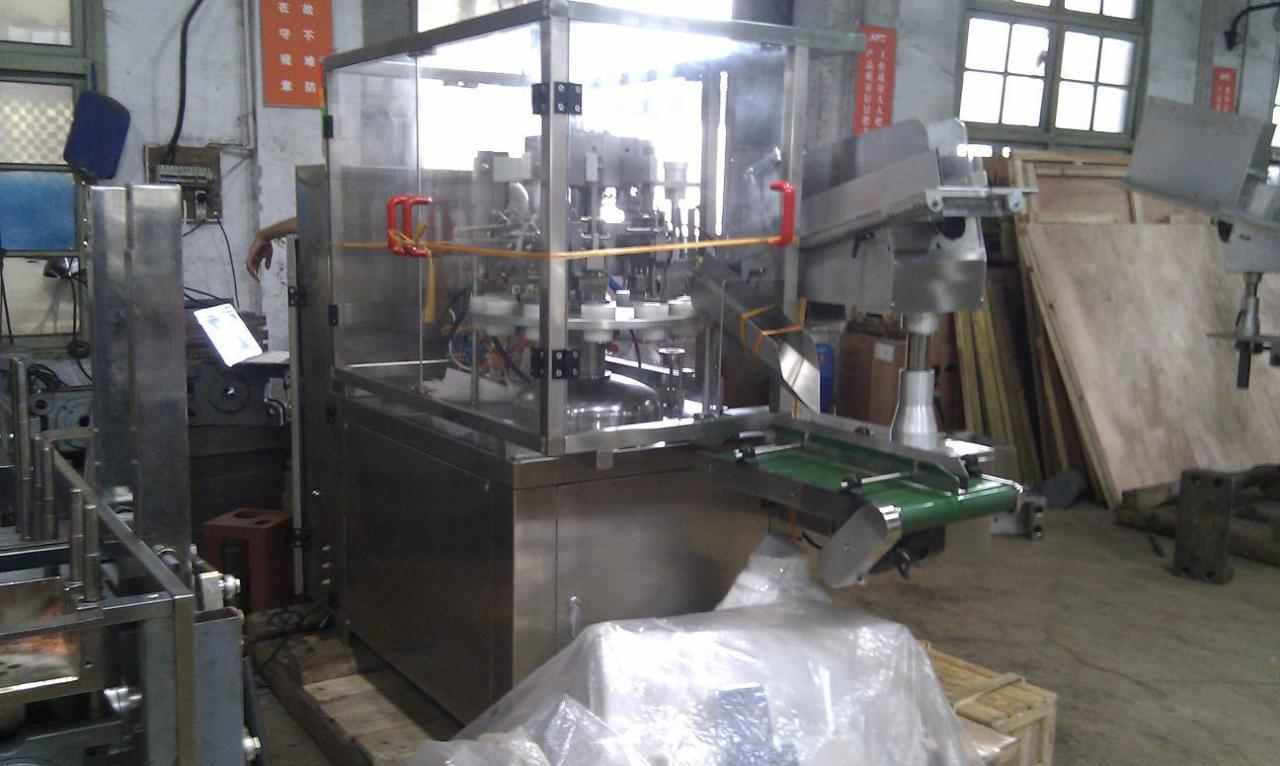 protective chamber for tube filler sealer.jpg