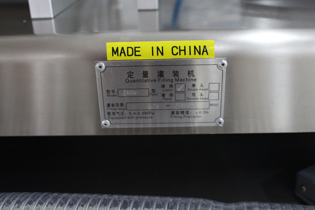 double filling nozzles filling machine.jpg